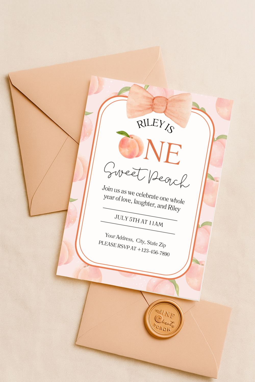 Peach-themed first birthday invitation with watercolor peaches, soft pink background, and peach bow, styled with beige envelopes and a wax seal. Text reads “Riley is ONE Sweet Peach.” Elegant flat lay for girl's 1st birthday summer party invite.